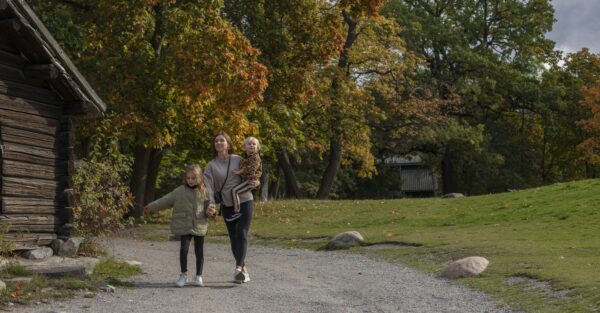 A family enjoying autumn at Skansen